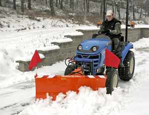 Sněhová radlice pro malé traktory.